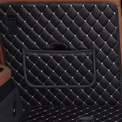 Storage pocket stitched onto the back of the rear seat on a Luxus trunk mat