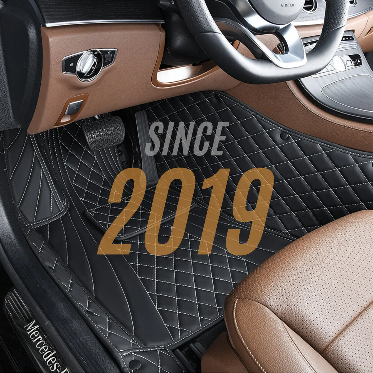 Luxus diamond stitched car mats in a Mercedes with a tan leather interior