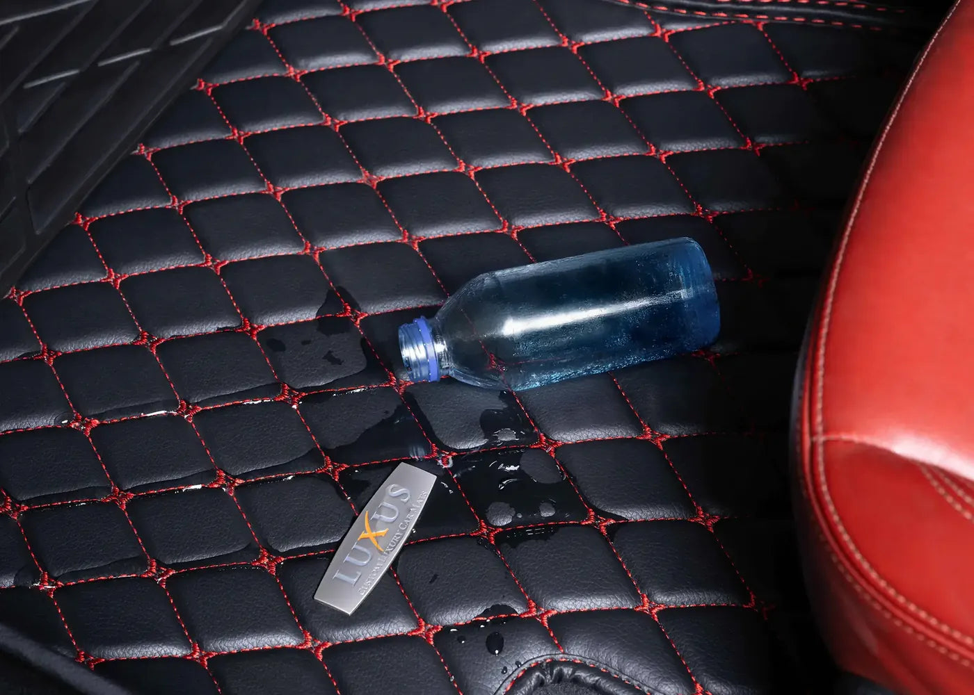 Water spilled from a bottle beading on the surface of a Luxus mat